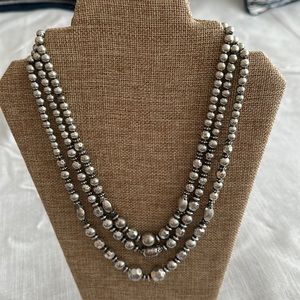 Silvertone multi strand necklace with extension